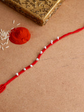 Load image into Gallery viewer, Adorn By Nikita Ladiwala Silver-Toned Handcrafted Rakhi Bracelet

