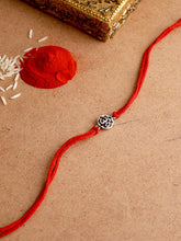 Load image into Gallery viewer, Adorn By Nikita Ladiwala Silver-Toned Handcrafted Rakhi Bracelet
